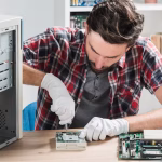 computer-technician-fixing-computer