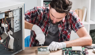 computer-technician-fixing-computer